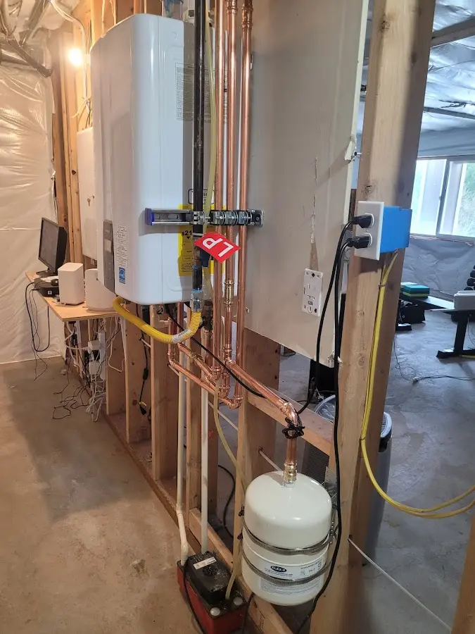 Licensed plumber repairing a kitchen sink in Anahola